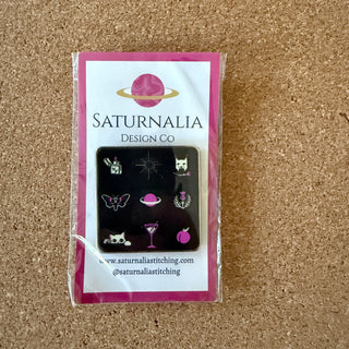 Saturnalia Logo Needle Minder