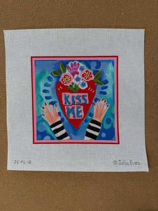 JE-PL-18 Julia Eves – “Kiss Me” Heart w/ Flowers & Hands – on blue/green background