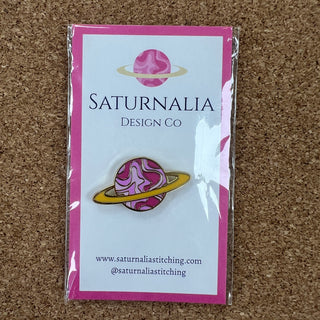 Saturnalia Logo Needle Minder